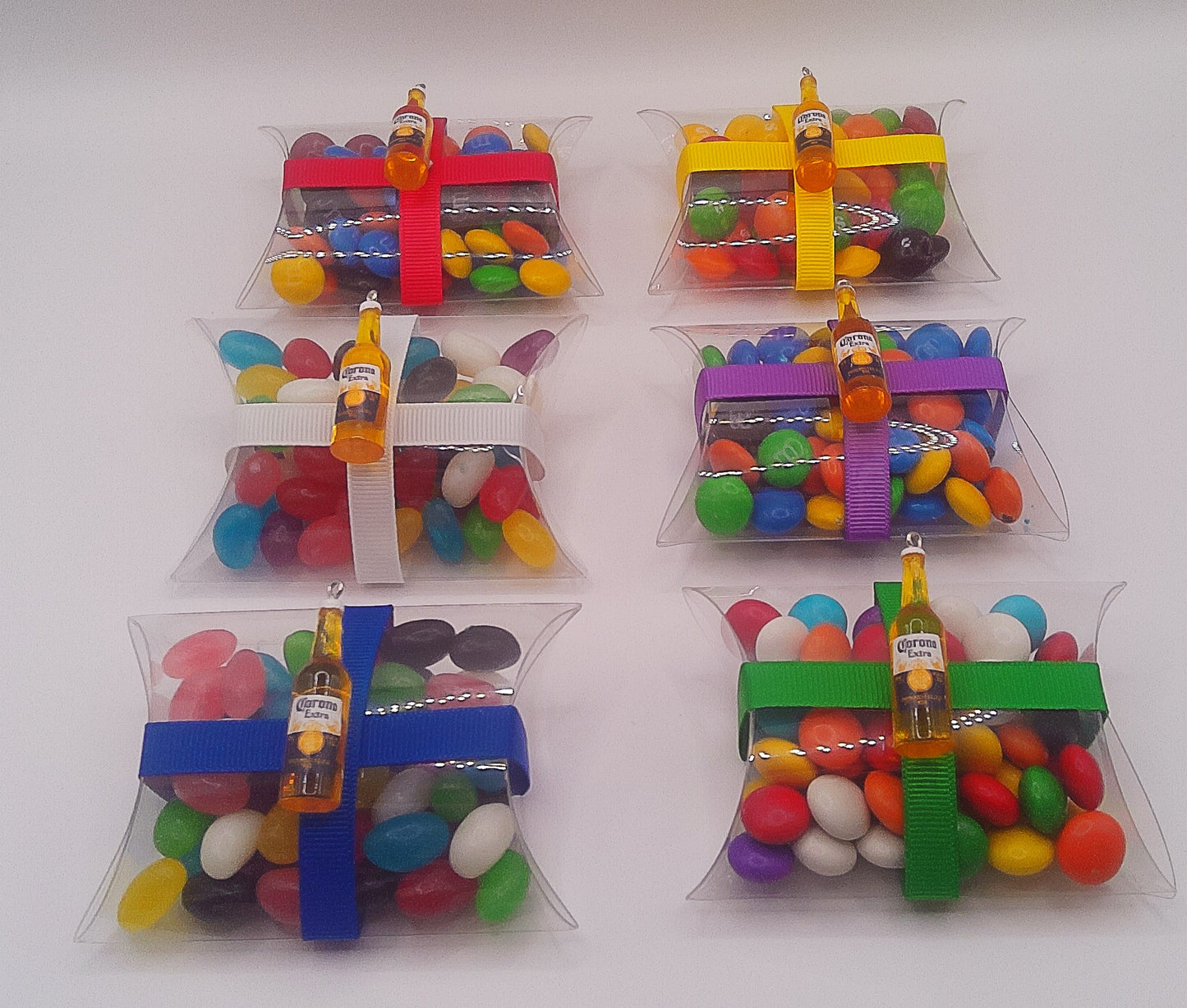 Beer bottle charm and clear pillow shaped box filled with lollies