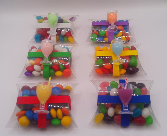 Cocktail charm with clear pillow shaped box filled with lollies