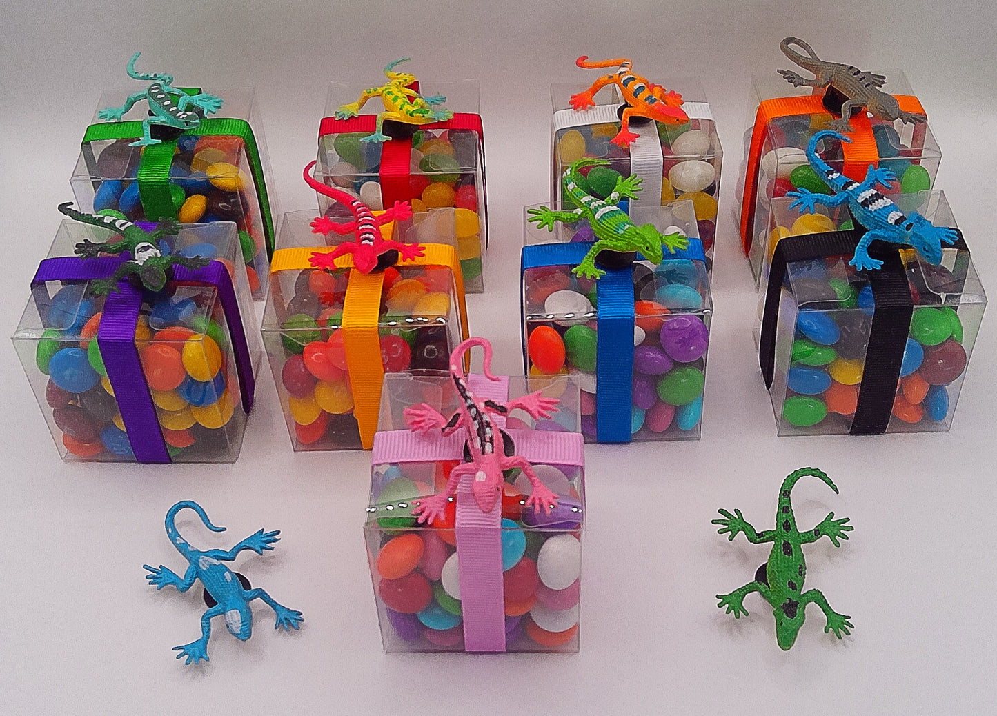Lizard shoe charms with clear box of lollies