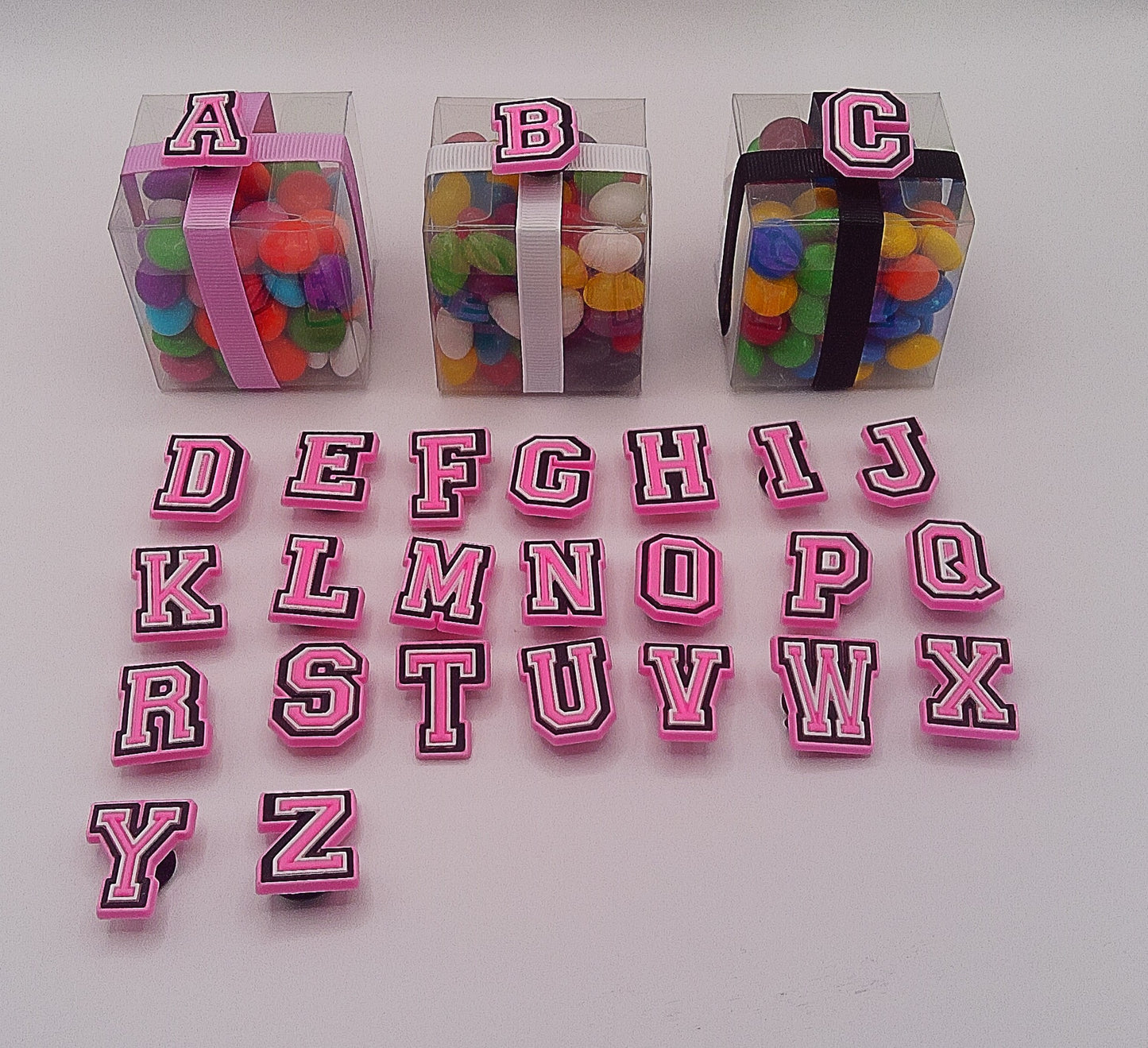 Alphabet shoe charms pink or white with clear box of lollies